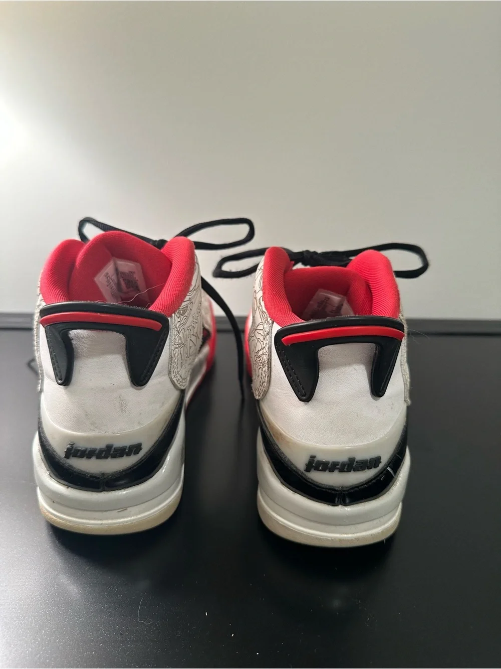 Jordan’s Nike Kids in Black, White & Red